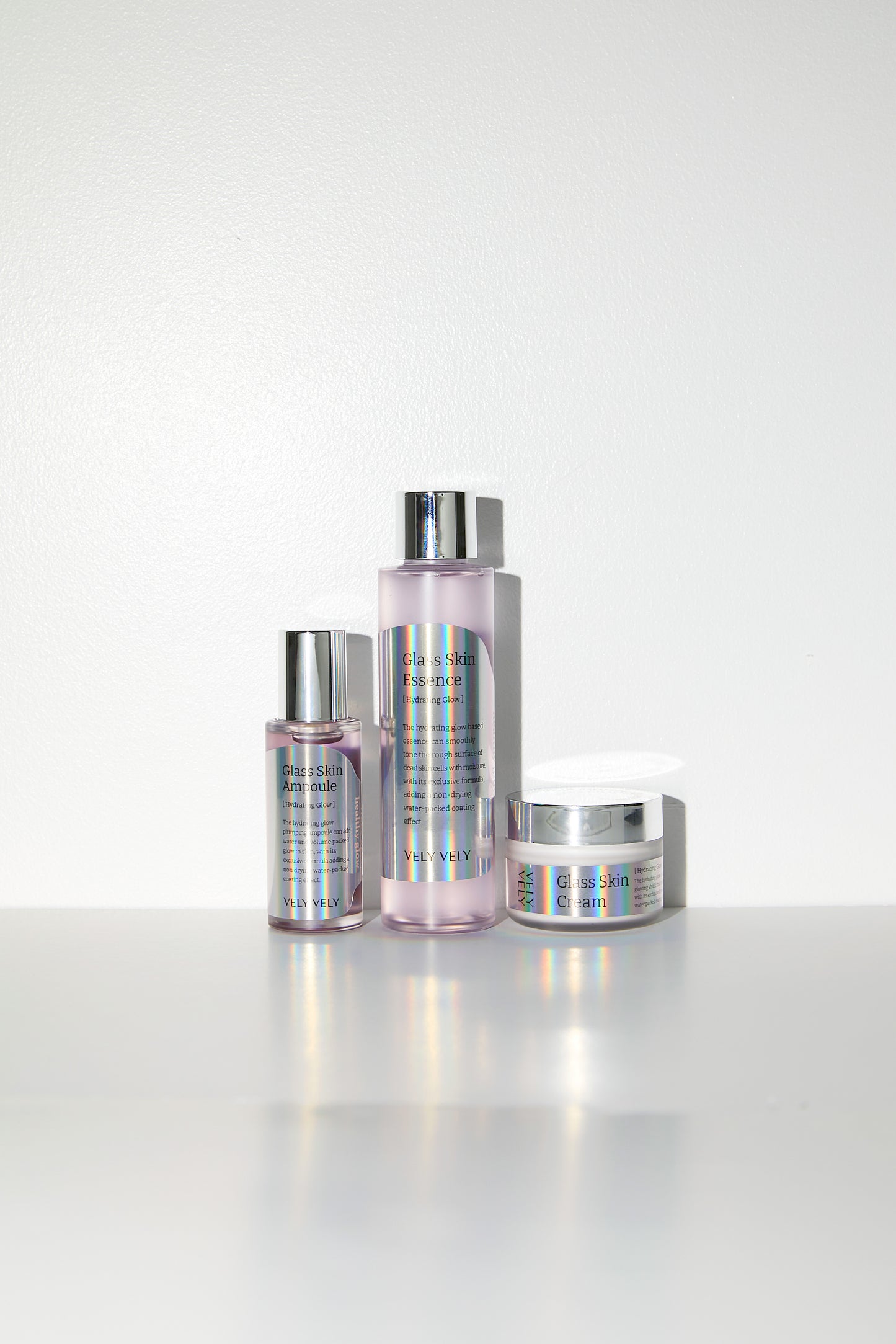 VELY VELY Glass Skin Bundle featuring essence, ampoule, and cream for radiant, hydrated skin.