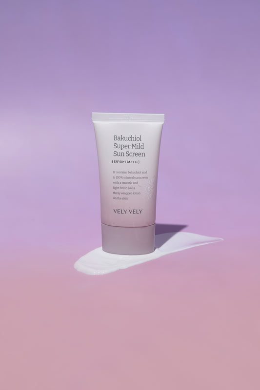 VELY VELY Bakuchiol Super Mild Sunscreen tube on pink background, offering effective UV protection and hydration.