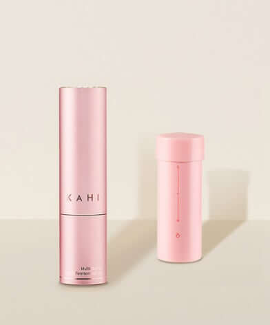 KAHI wrinkle multi balm and refill set on a neutral background, showcasing a pink packaging design.