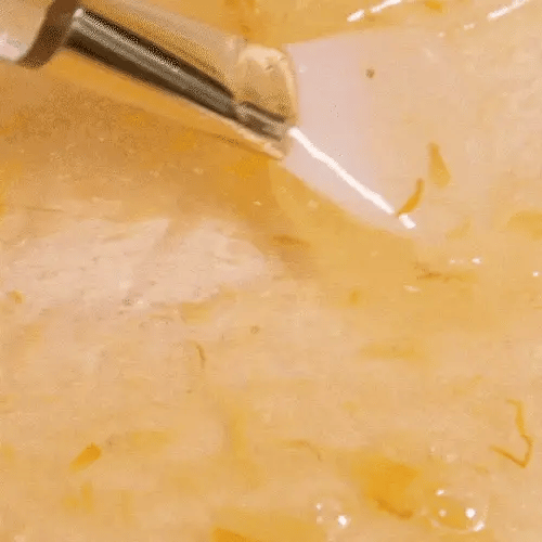 Applying APRILSKIN Calendula Peel Off Mask 100g for smooth and radiant skin