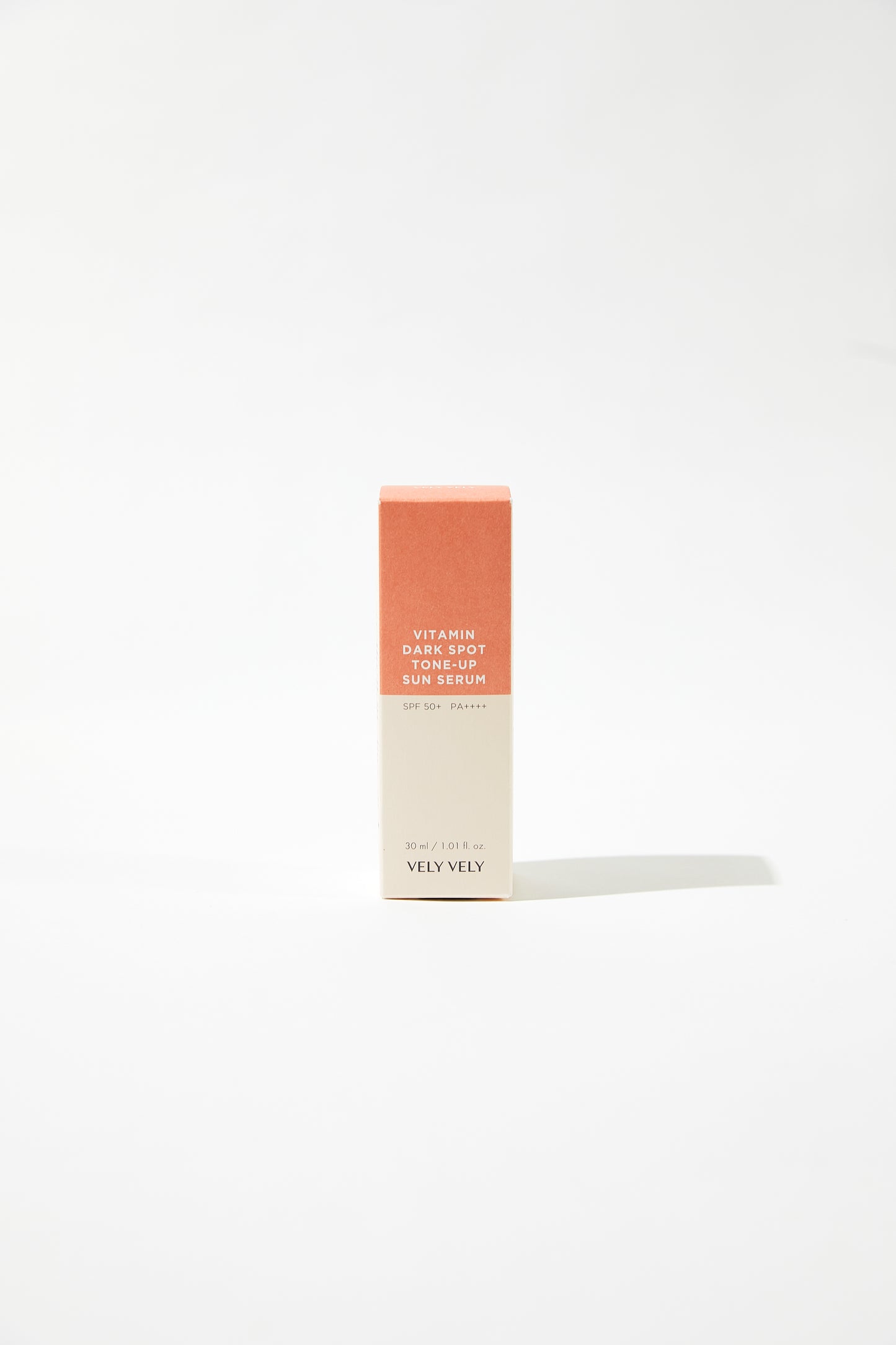 VELY VELY Vitamin Dark Spot Tone-Up Sun Serum packaging in minimalist design against a white background.
