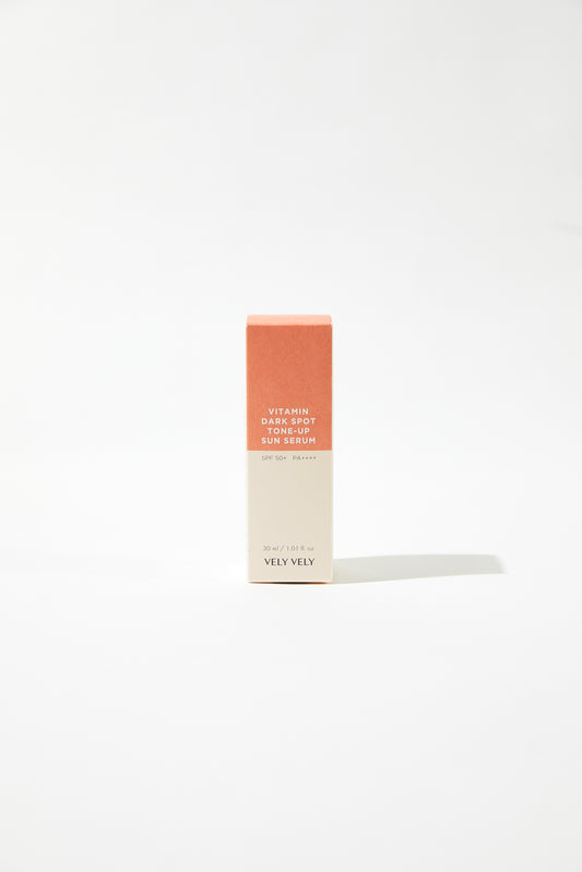 VELY VELY Vitamin Dark Spot Tone-Up Sun Serum packaging in minimalist design against a white background.
