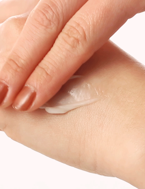 Applying MISSHA Time Revolution Night Repair Ampoule Cream