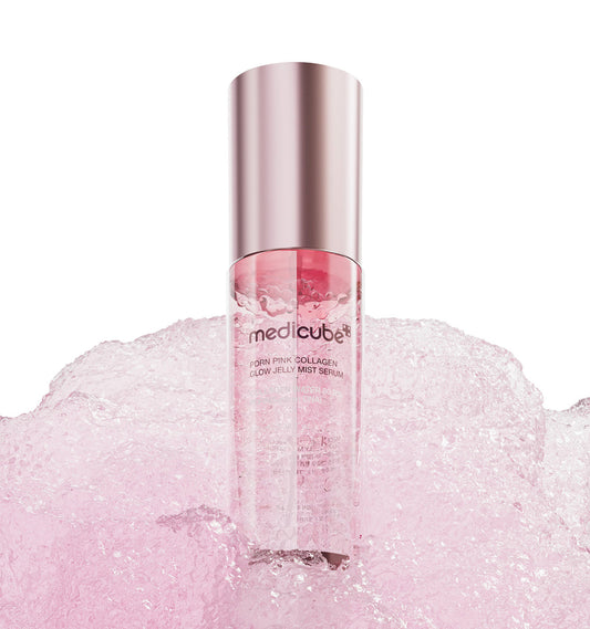 Medicube PDRN Pink Collagen Glow Jelly Mist Serum 100ml surrounded by pink bubbles.