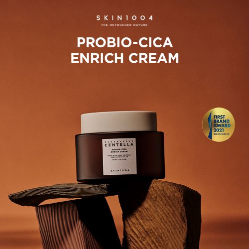 Skin1004 Probio-Cica Enrich Cream in stylish packaging on a wooden texture surface